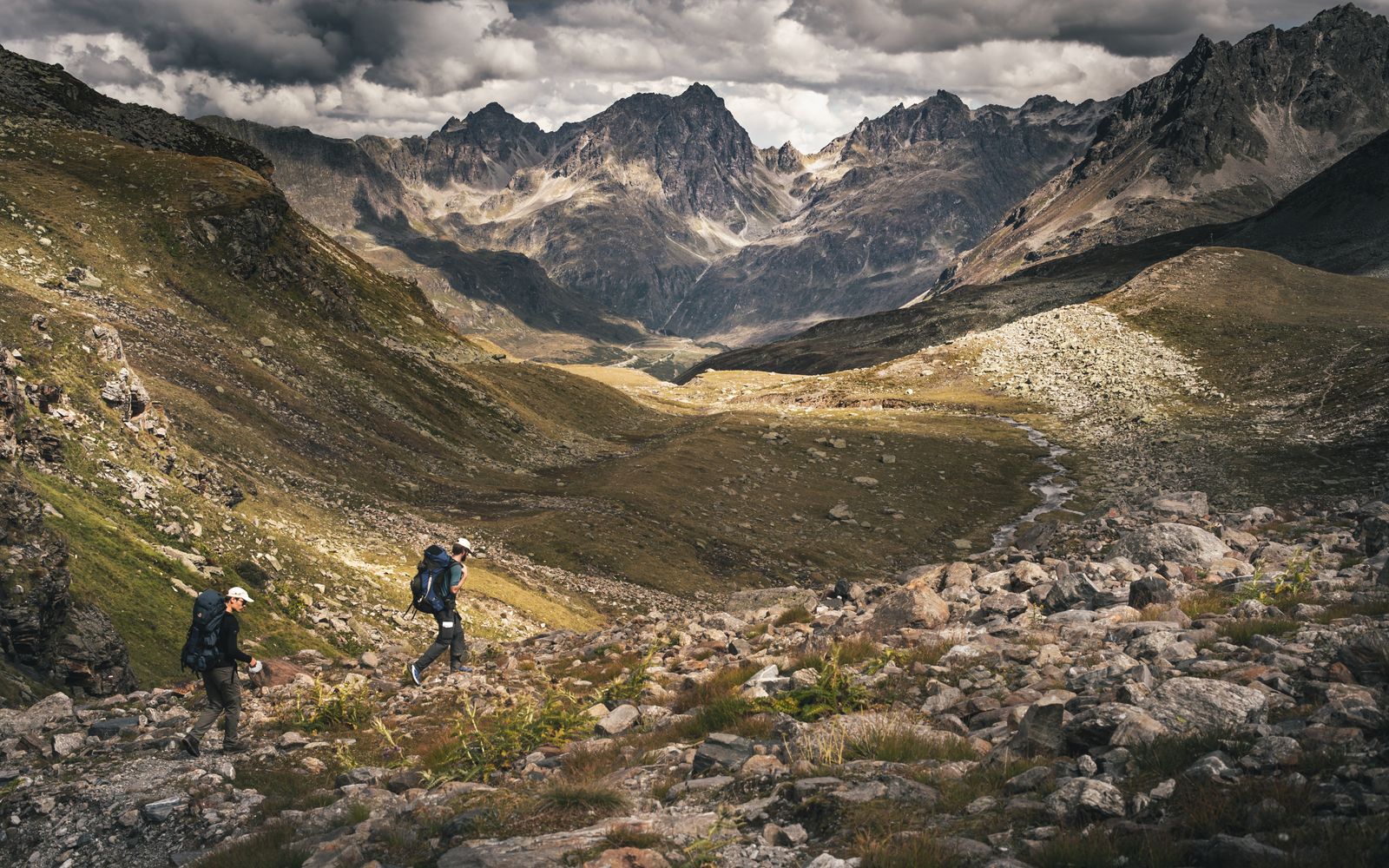 Changing weather over an open mountain landscape