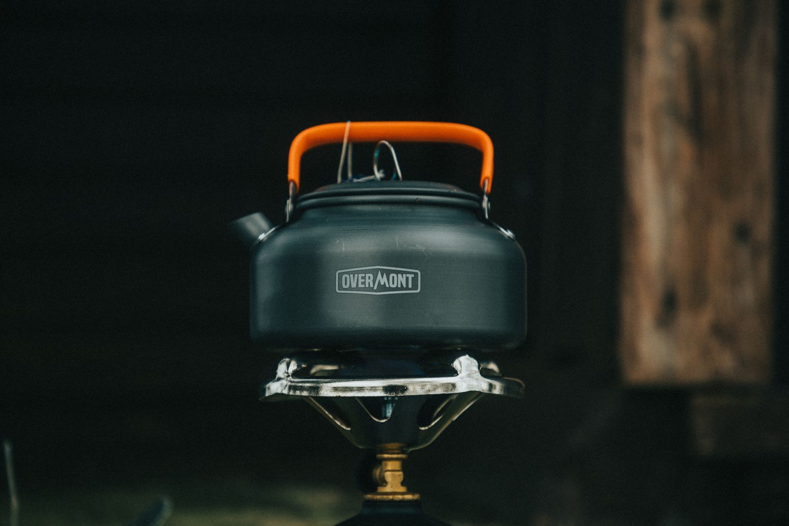 Best Two-Burner Camping Stoves for Family Campsites Camping kettle heating on a portable outdoor stove