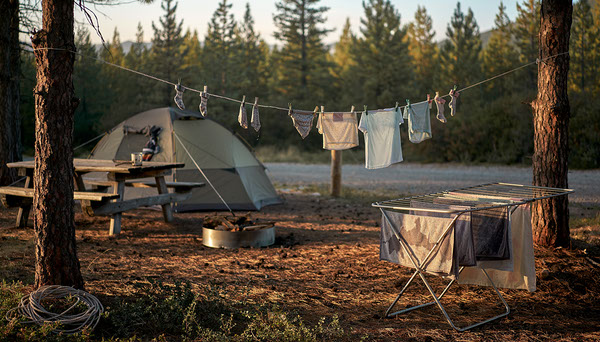Camping Clothesline vs Portable Drying Rack for Trips Campground clothesline and drying rack