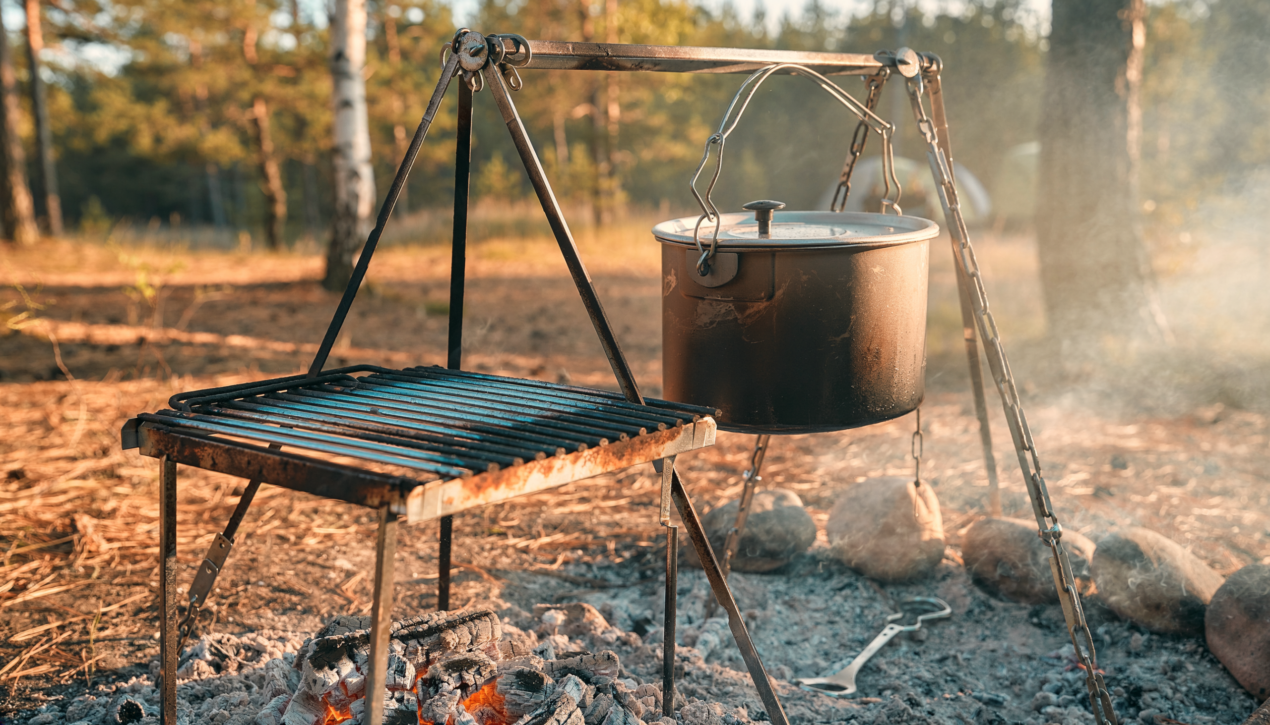 Grate and cooking tripod at campsite