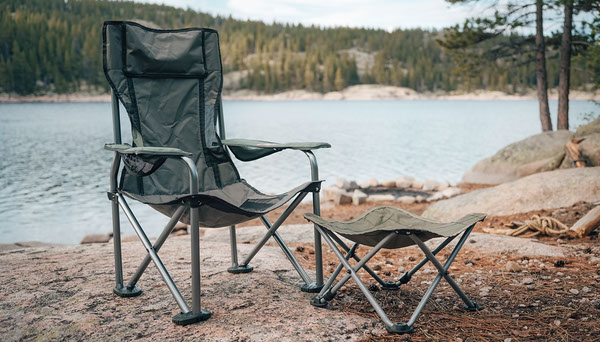 High-Back Camping Chair vs Low Chair: Which Is More Comfortable? Two styles of camping chairs by a lake