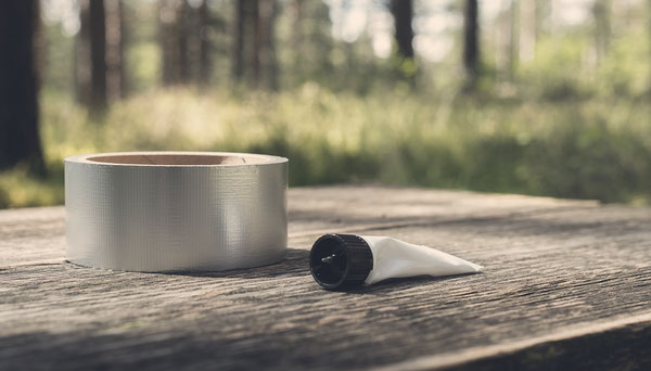 Gear Repair Tape vs Seam Sealer: Which Fixes a Leaky Tent? Gear Repair Tape vs Seam Sealer: Which Fixes a Leaky Tent? illustrative photograph
